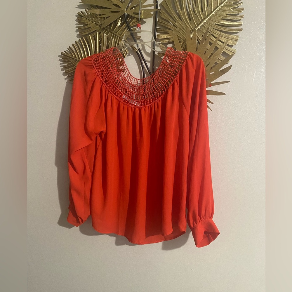 Have Vibrant Red Blouse with Embellished Neckline